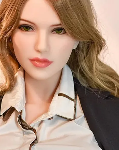 Realistic doll head and shoulders in a white blouse